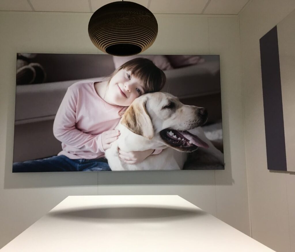 fotopaneel van cliënt met verstandelijke beperking erop