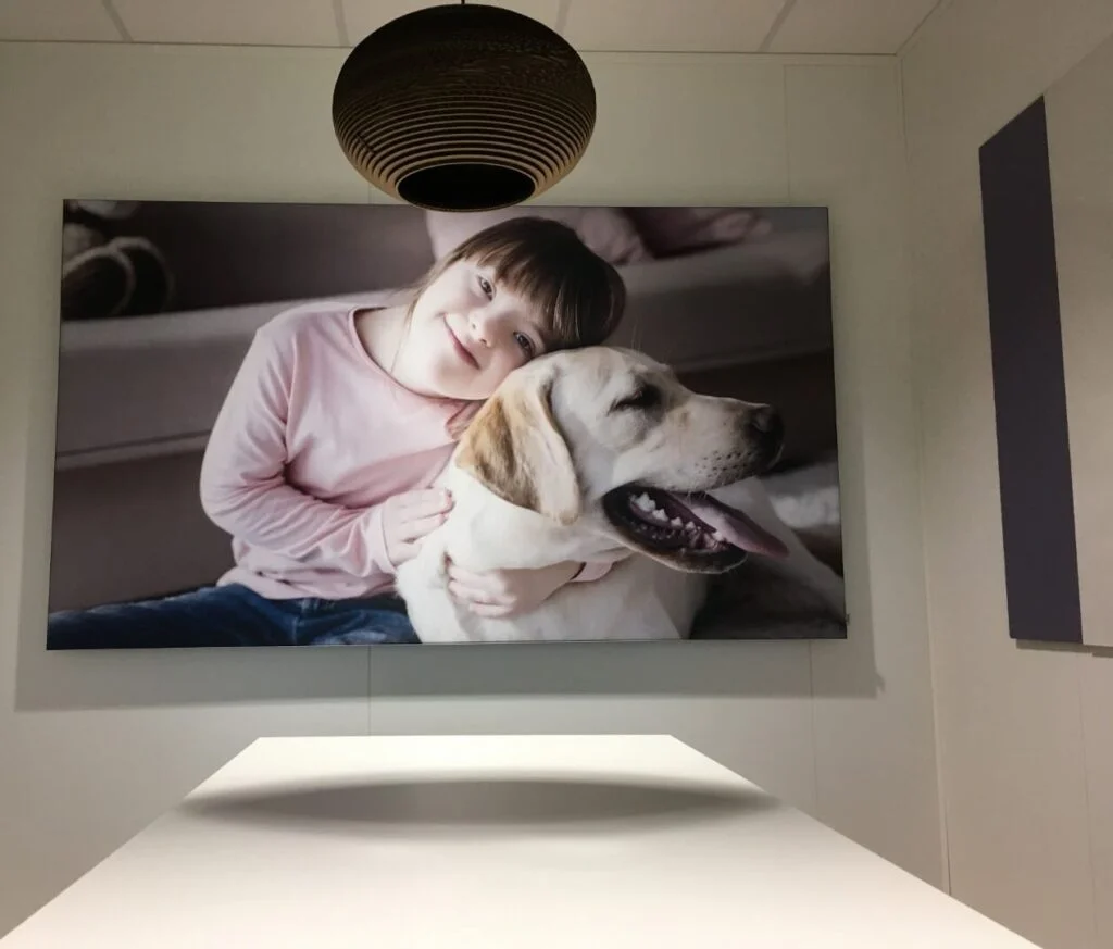 fotopaneel van cliënt met verstandelijke beperking erop